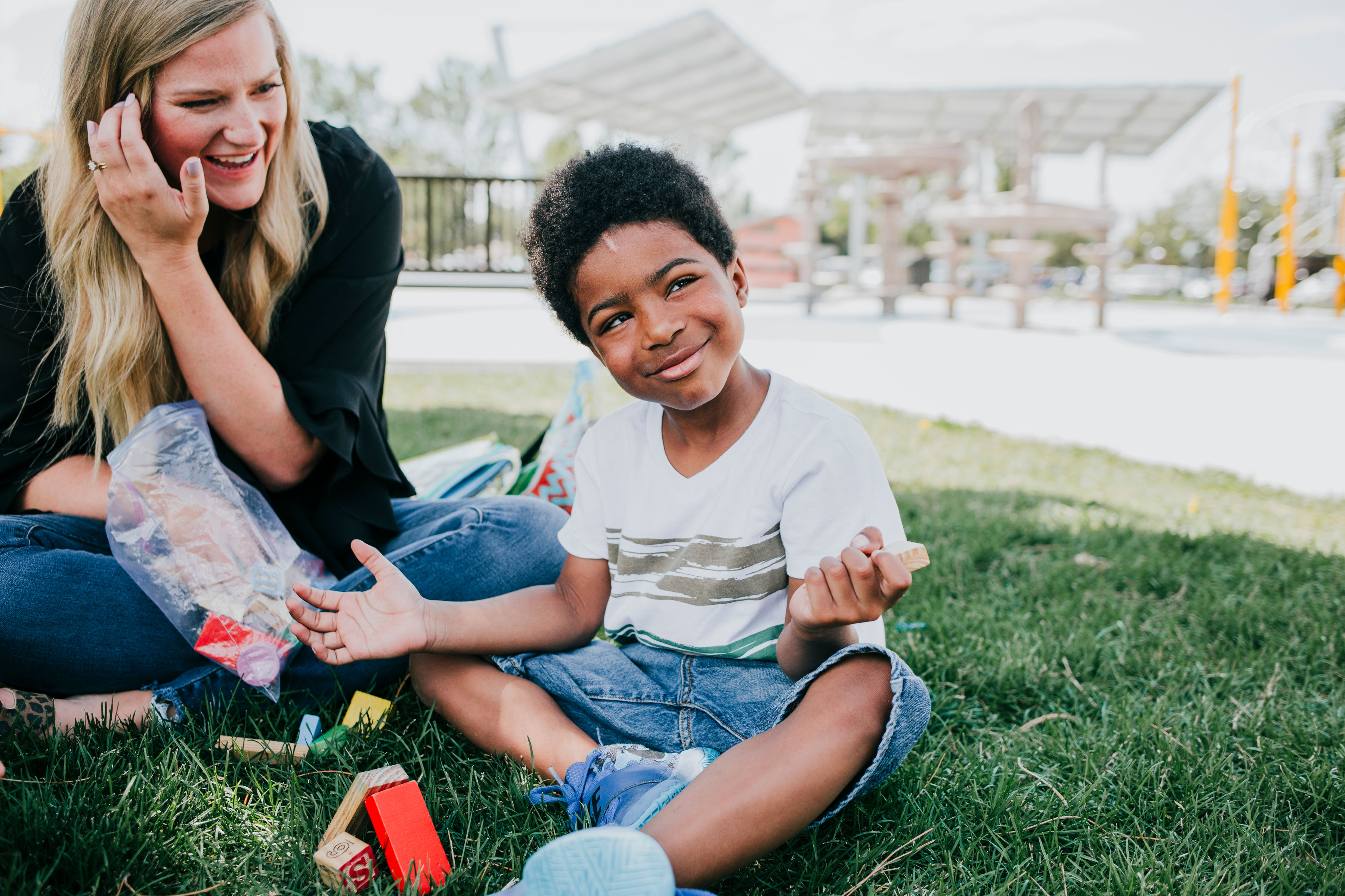 Child practicing speech sounds during therapy